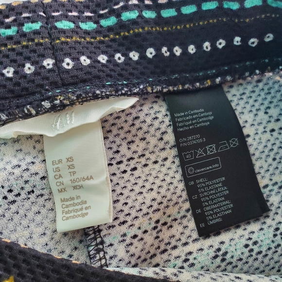 H&M black skirt with stripes pattern designs in yellow, white and aqua c… - Picture 2 of 3